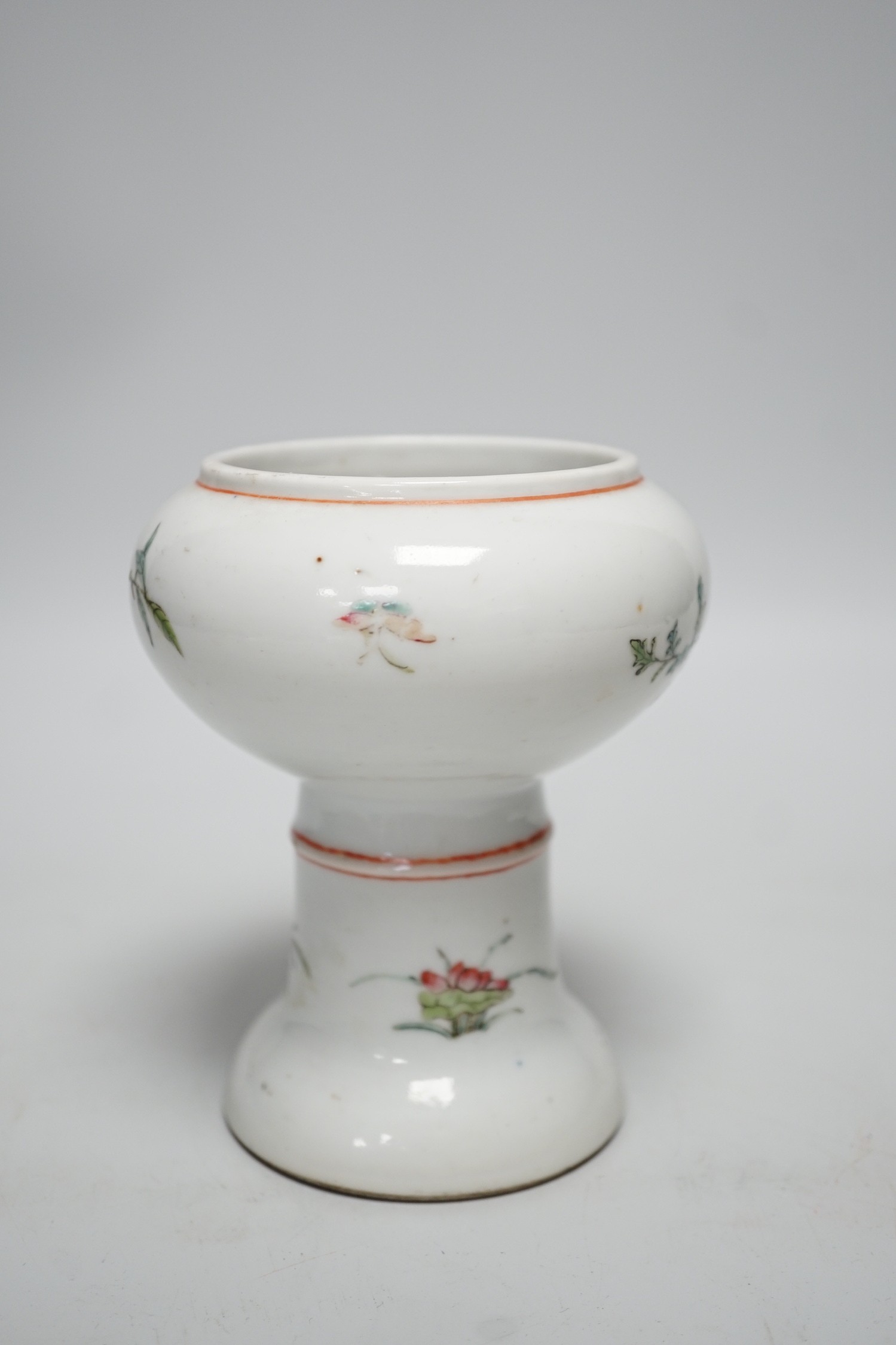 A 19th century Chinese stem cup, painted with flowers and fruit 12cm